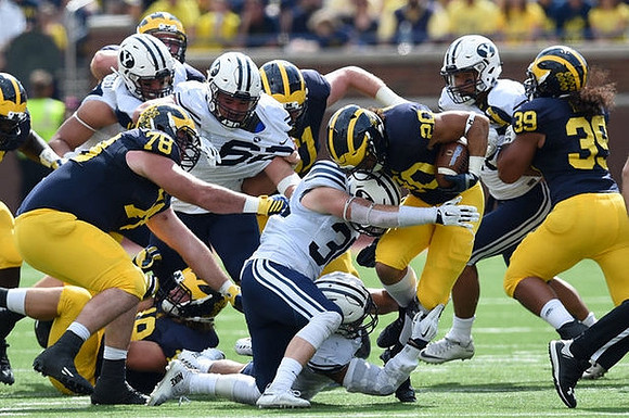 Erik Magnuson (78), Drake Johnson (20), and Sione Houma (39)