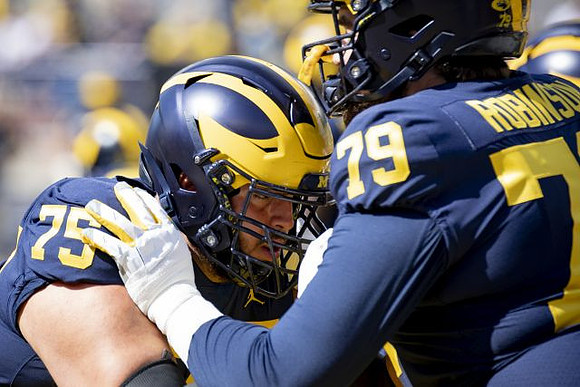 Jon Runyan (75) and Greg Robinson (79)