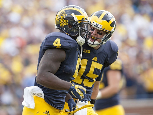 De'Veon Smith (4) and Jake Rudock (15)