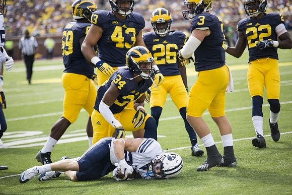 Willie Henry (69), Chris Wormley (43), Jeremy Clark (34), Jourdan Lewis (26), Desmond Morgan (3), and Jarrod Wilson (22)