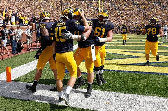 Jake Rudock (15), Mason Cole (52), Ben Braden (71), Graham Glasgow (61), Erik Magnuson (78), and Khalid Hill (80)