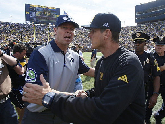 Brigham Young Head Coach Bronco Mendenhall and Jim Harbaugh