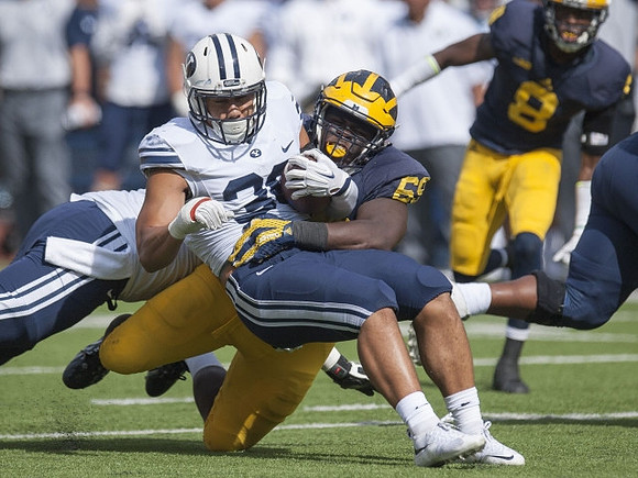 Willie Henry (69) and Channing Stribling (8)