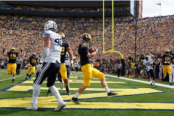 Henry Poggi (19), Sione Houma (39), and Jake Rudock (15)