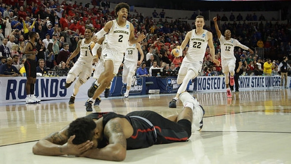 Jordan Poole (2), Charles Matthews (1), Moritz Wagner (13), Duncan Robinson (22), and Muhammad-Ali Abdur-Rahkman (12)