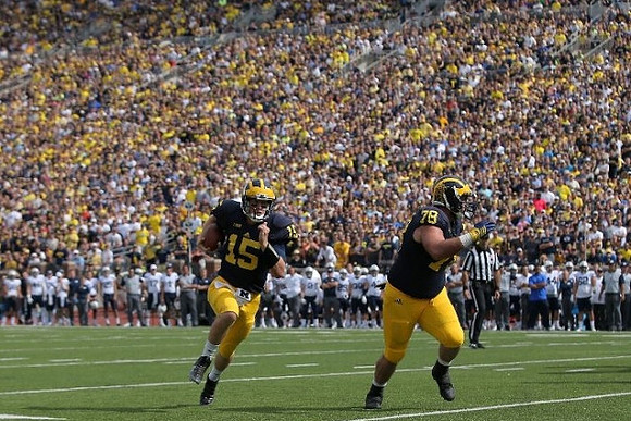 Jake Rudock (15) and Erik Magnuson (78)