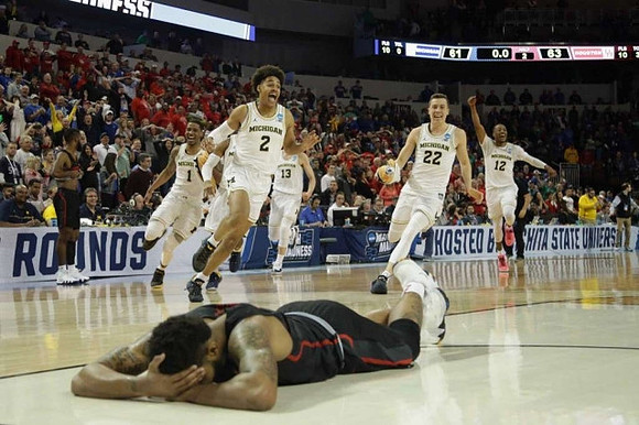 Jordan Poole (2), Charles Matthews (1), Moritz Wagner (13), Duncan Robinson (22), and Muhammad-Ali Abdur-Rahkman (12)