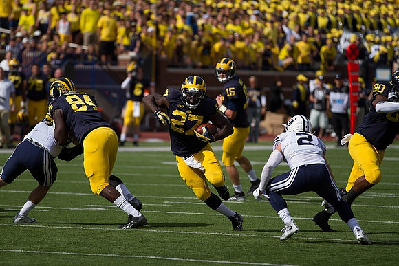 A.J. Williams (84), Derrick Green (27), Jake Rudock (15), and Khalid Hill (80)