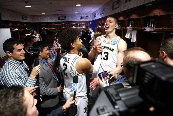Jordan Poole (2) and Moritz Wagner (13)