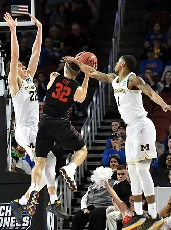Duncan Robinson (22) and Charles Matthews (1)