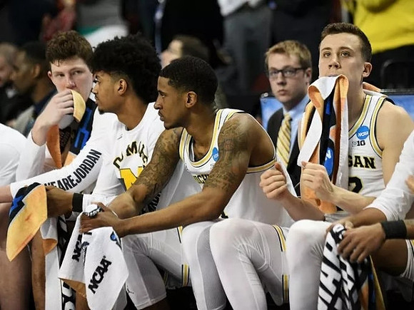 Jon Teske (15), Ibi Watson (23), Charles Matthews (1), and Duncan Robinson (22)
