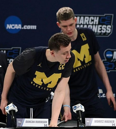 Duncan Robinson (22) and Moritz Wagner (13)