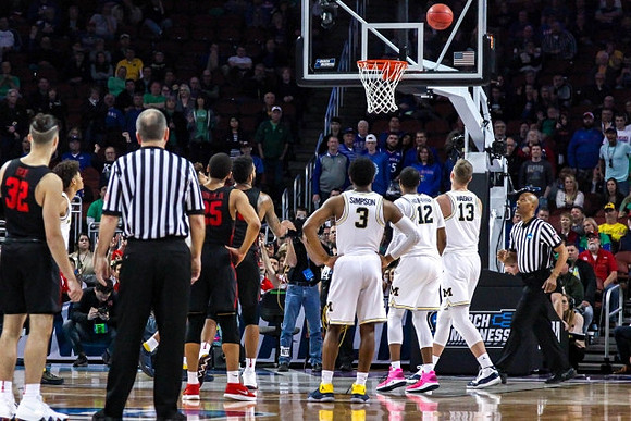 Jordan Poole (2), Zavier Simpson (3), Muhammad-Ali Abdur-Rahkman (12), and Moritz Wagner (13)