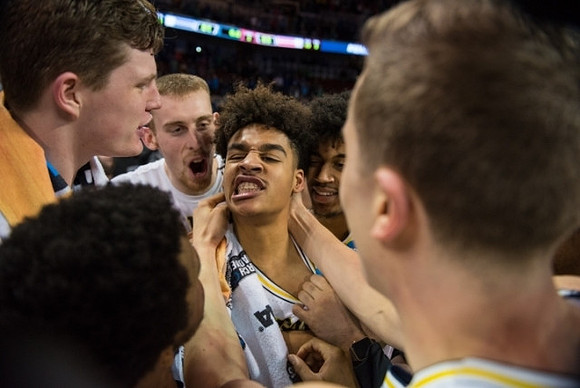 Jordan Poole (2), Zavier Simpson (3), Jon Teske (15), Austin Davis (51), Ibi Watson (23), and Duncan Robinson (22)