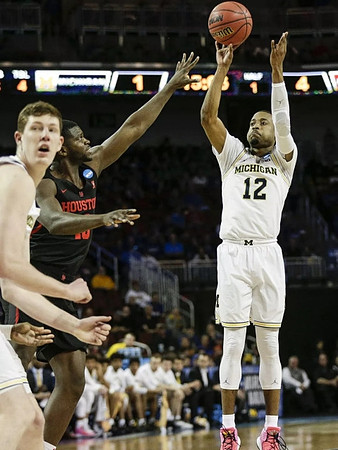 Jon Teske (15) and Muhammad-Ali Abdur-Rahkman (12)