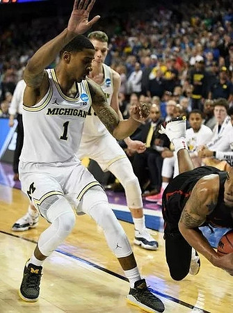 Charles Matthews (1) and Moritz Wagner (13)