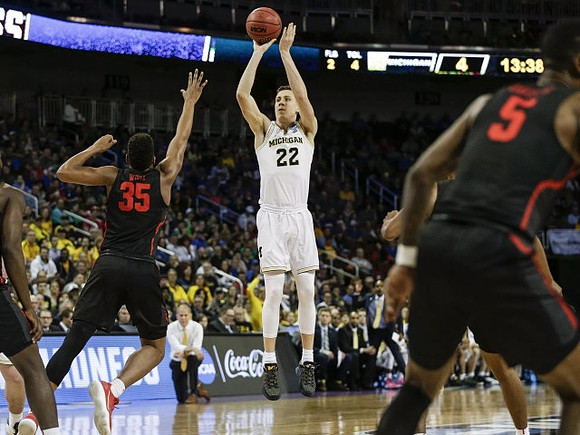 Duncan Robinson (22) and John Beilein