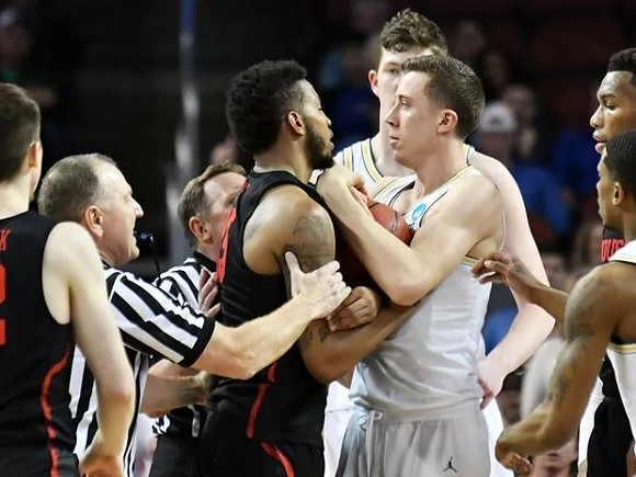 Duncan Robinson (22), Jon Teske (15), and Charles Matthews (1)