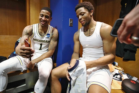 Charles Matthews (1) and Zavier Simpson (3)