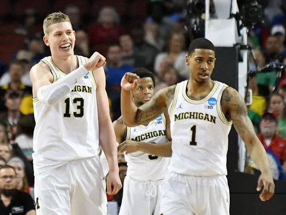 Moritz Wagner (13), Zavier Simpson (3), and Charles Matthews (1)