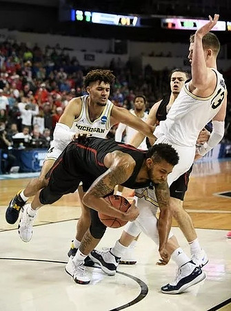 Isaiah Livers (4), Zavier Simpson (3), and Moritz Wagner (13)