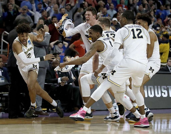 Jordan Poole (2), Charles Matthews (1), Jon Teske (15), Moritz Wagner (13), Muhammad-Ali Abdur-Rahkman (12), and Isaiah Livers (4)