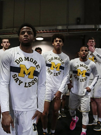 Austin Davis (51), Zavier Simpson (3), Jordan Poole (2), Jaaron Simmons (5), and Jon Teske (15)