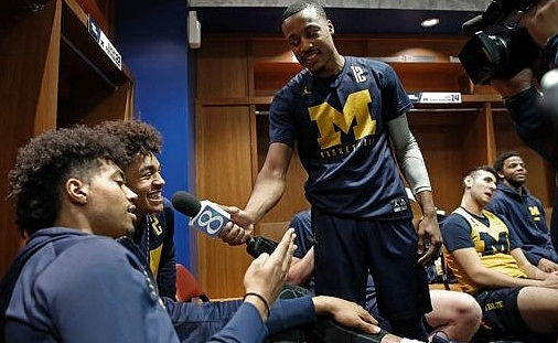 Ibi Watson (23), Jordan Poole (2), and Muhammad-Ali Abdur-Rahkman (12)