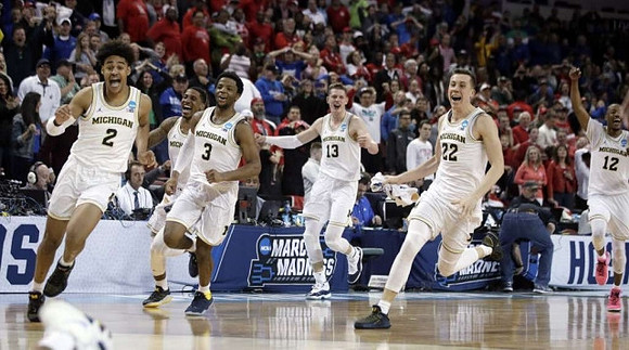 Jordan Poole (2), Charles Matthews (1), Zavier Simpson (3), Moritz Wagner (13), Duncan Robinson (22), and Muhammad-Ali Abdur-Rahkman (12)