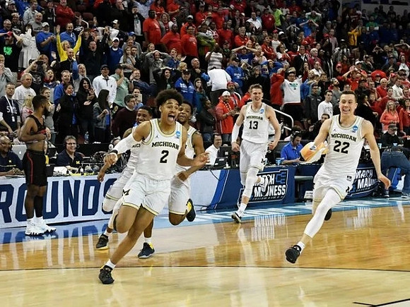 Jordan Poole (2), Charles Matthews (1), Moritz Wagner (13), and Duncan Robinson (22)