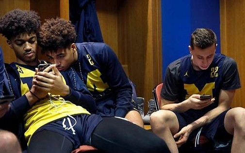 Ibi Watson (23), Jordan Poole (2), and Duncan Robinson (22)