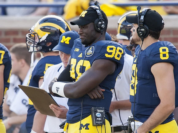 Devin Gardner (98) and Russell Bellomy (8)