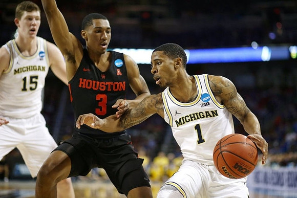 Jon Teske (15) and Charles Matthews (1)