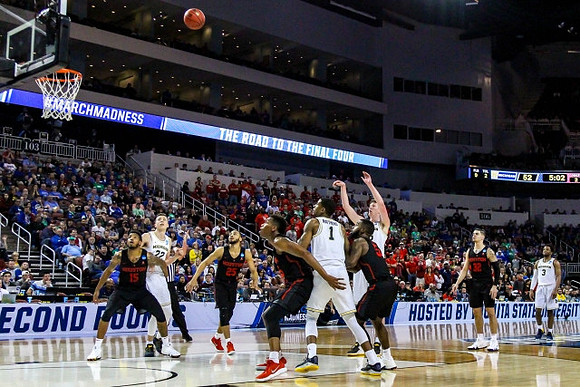 Duncan Robinson (22), Charles Matthews (1), Jon Teske (15), and Zavier Simpson (3)