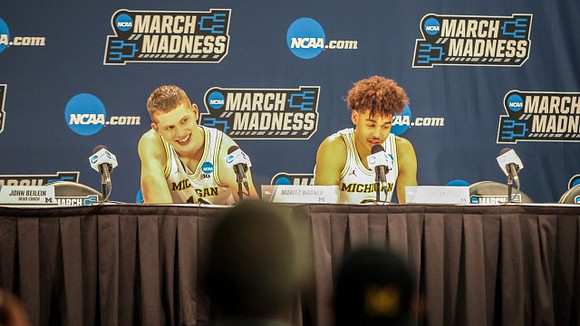 Moritz Wagner (13) and Jordan Poole (2)