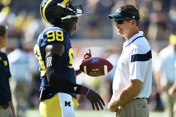 Devin Gardner (98) and Doug Nussmeier