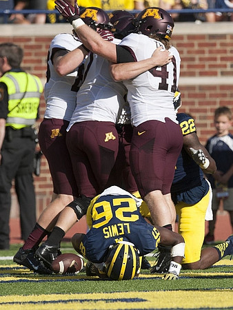 Jourdan Lewis (26) and Jarrod Wilson (22)