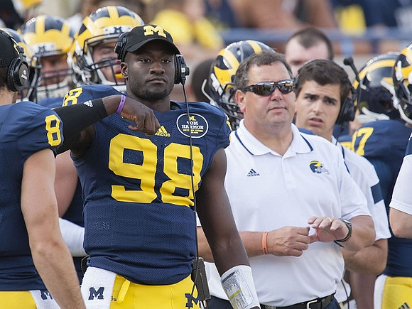 Devin Gardner (98) and Brady Hoke