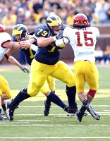 Adam Stenavich (79) and Chad Henne (7)