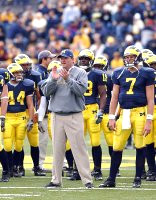 Terry Malone, Antonio Bass (18), and Chad Henne (7)