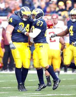 Will Paul (34), Brandon Harrison (27), and Darnell Hood (4)