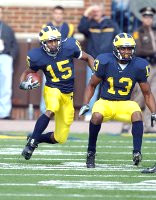 Steve Breaston (15) and Grant Mason (13)