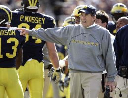 Lloyd Carr, Grant Mason (13), and Pat Massey (94)