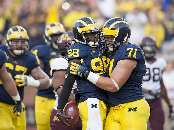 Devin Gardner (98) and Ben Braden (71)