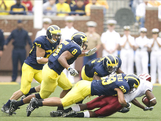 Jordan Kovacs (32), Jonas Mouton (8), Donovan Warren (6), and Troy Woolfolk (29)