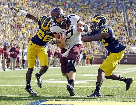 Jourdan Lewis (26) and Jarrod Wilson (22)