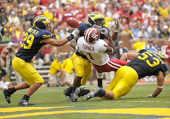 Troy Woolfolk (29), Stevie Brown (3), and Ryan Van Bergen (53)