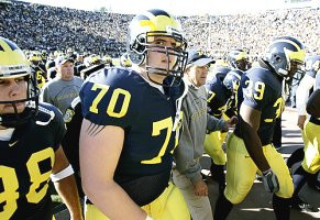 Garrett Rivas (38), Jeremy Ciulla (70), Lloyd Carr, and Andre Criswell (39)