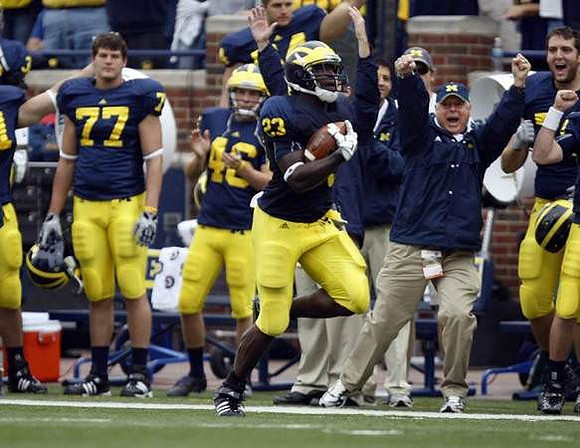Carlos Brown (23), Taylor Lewan (77), and Jon Bills (46)