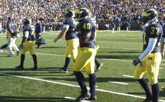 Shawn Crable (2), Mike Kolodziej (76), Obi Oluigbo (40), and Chris Graham (37)